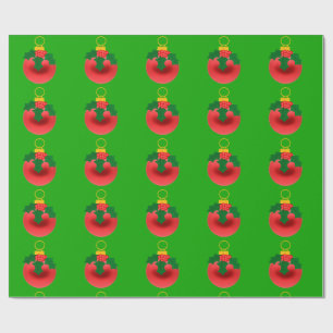 Red and Holly Ornament on Green Wrapping Paper