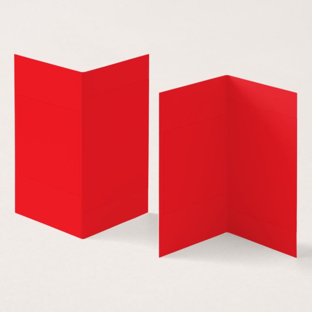 Red and orange crayons lying side by side on a whi (Inside and Outside)