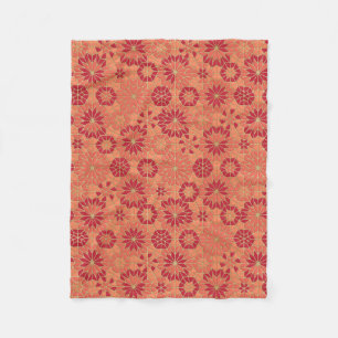 Red and orange pattern fleece blanket