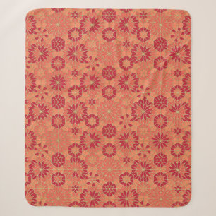 Red and orange pattern sherpa blanket