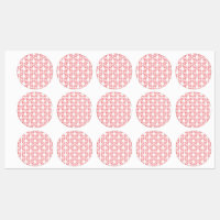 Red and pink wrapping paper featuring a repeating 