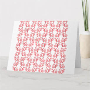 Red and pink wrapping paper featuring a repeating  card