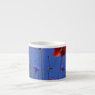 red and purple roses embracing a blue sky and sun espresso cup