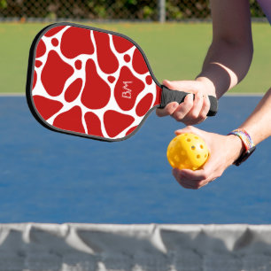 Red and white abstract giraffe pattern pickleball paddle