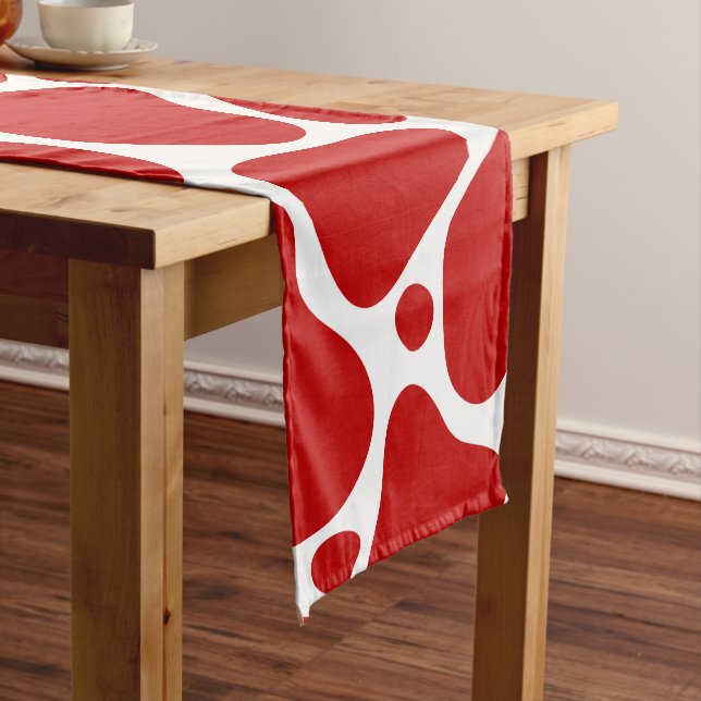 Red and white abstract giraffe pattern short table runner (In Situ)