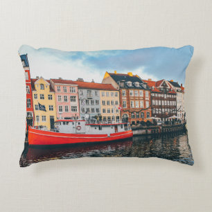 RED AND WHITE CONCRETE BUILDING DECORATIVE CUSHION