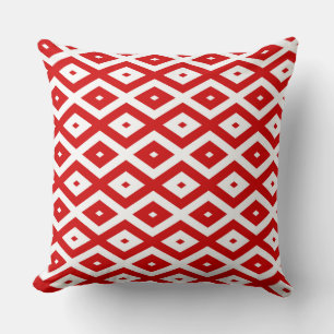 Red and white diamond pattern cushion