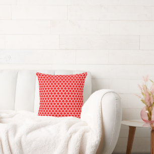 Red and white diamond pattern cushion