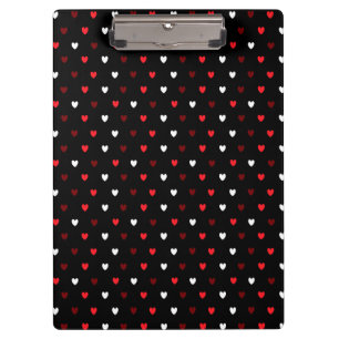 Red and white hearts on black clipboard