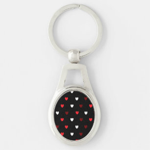 Red and white hearts on black key ring