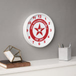Red and White Star Retro Advertising Style Clock<br><div class="desc">This clock in red and white was inspired by vintage gasoline advertising designs. It has a red star shape at the centre that can be personalised with an initial, and a red ring that can be personalised with your family name and your "established" date or any custom text you choose....</div>