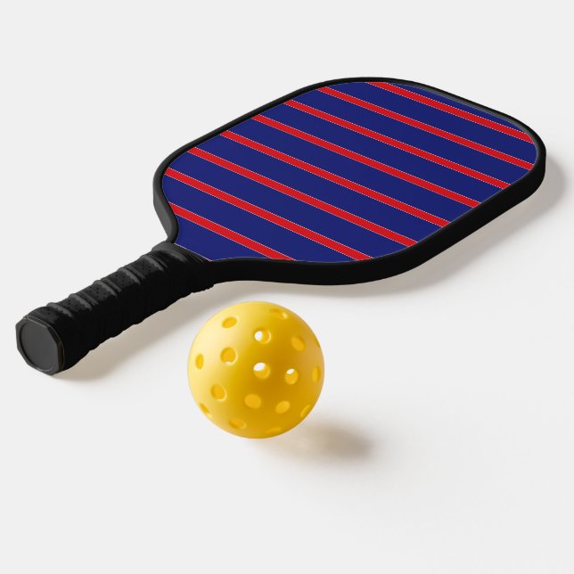 Red and white stripe on navy blue pickleball paddle (Laydown 2)