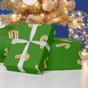 Red and yellow candy canes green wrapping paper