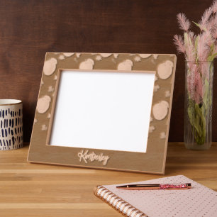 Red apples and leaves on black etched frames