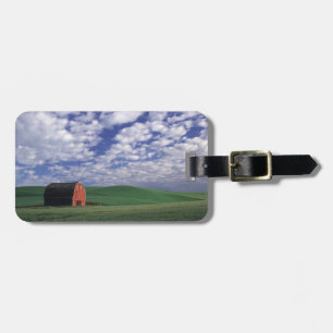 Red barn in wheat & barley field in Whitman Luggage Tag