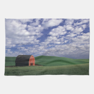Red barn in wheat & barley field in Whitman Tea Towel