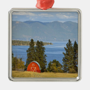Red barn sits along scenic Flathead Lake near Metal Ornament