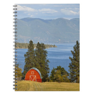 Red barn sits along scenic Flathead Lake near Notebook