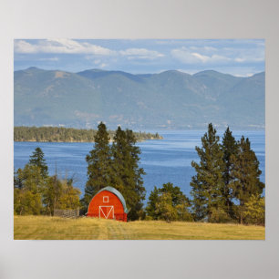Red barn sits along scenic Flathead Lake near Poster