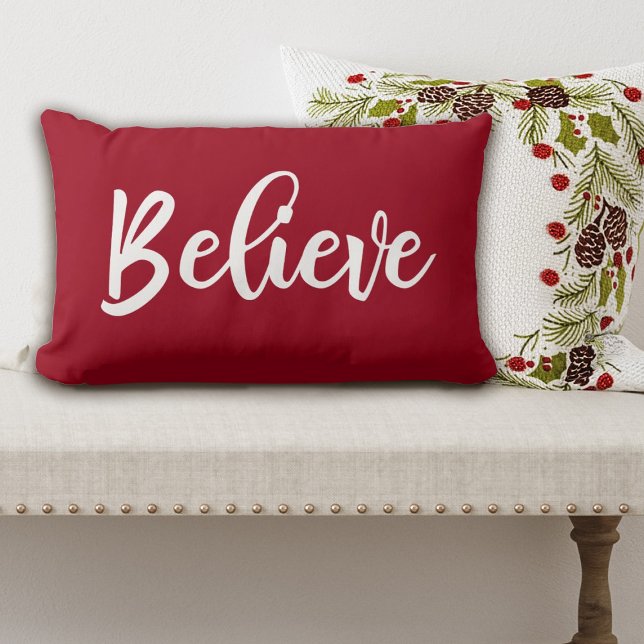 Red Believe Script Christmas pillow (Believe Christmas pillow in an elegant script font. so pretty for your Christmas decor.)