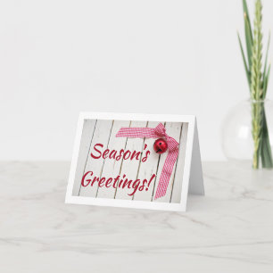 Red Bell And Red Chequered Bow On Wood  Christmas Card