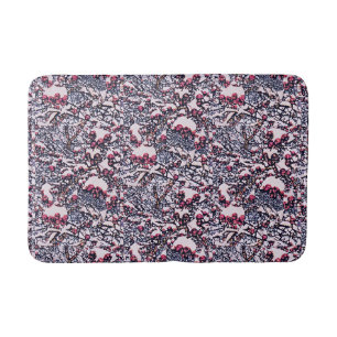 Red berries and snow. bath mat