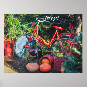 Red bike with baskets and pumpkins poster