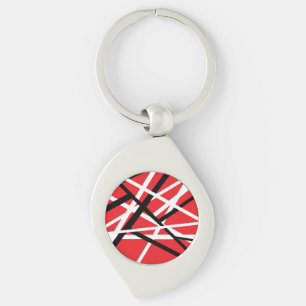 red, black, and white graphic key ring