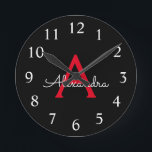 Red Black Script Girly Monogram Name Round Clock<br><div class="desc">Red and Black Simple Script Monogram Name Clock. This makes the perfect sweet 16 birthday,  wedding,  bridal shower,  anniversary,  baby shower or bachelorette party gift for someone that loves glam luxury and chic styles.</div>