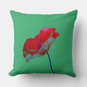 Red blue poppy on emerald green cushion