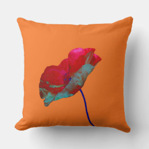 Red blue poppy on warm orange cushion