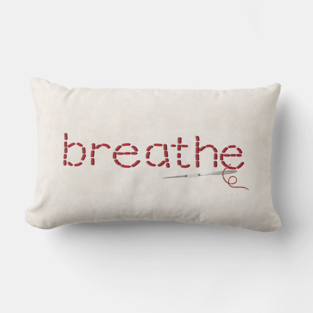 red Breathe text stitch with needle Lumbar Cushion (Front)