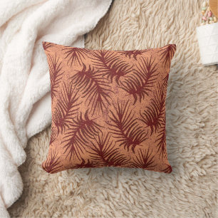 Red-brown leaves on a mottled background. cushion