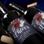 Red Burgundy White Navy Blue Floral Cheers Wedding Wine Label<br><div class="desc">Cheers typography script and a watercolor red burgundy and white peony flowers bouquet with pine green seasonal fir branches, red berries and foliage together with your name / names over a dark midnight navy blue chalkboard background making an inspired personalised wine label for your Christmas rustic elegant floral wedding or...</div>
