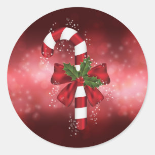 Red Candy Cane On A Red Bokeh Background Classic Round Sticker