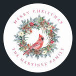 Red Cardinal Pine Wreath Merry Christmas Classic Round Sticker<br><div class="desc">Add a special touch to your envelopes or gift giving. Designed to coordinated with the Elegant Christmas Wreath and Cardinal collection. A red cardinal is nestled in a traditional pine wreath decorated with berries,  pinecones and flowers. Greeting is written above and your name below.</div>