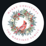 Red Cardinal Pine Wreath Merry Christmas Classic Round Sticker<br><div class="desc">Add a special touch to your envelopes or gift giving. Designed to coordinated with the Elegant Christmas Wreath and Cardinal collection. A red cardinal is nestled in a traditional pine wreath decorated with berries,  pinecones and flowers. Greeting is written above and your name below.</div>