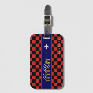 red chequered luggage tag air travel adventures