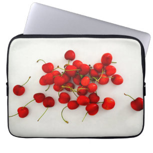 Red Cherries in Natural Light Lay on White Laptop Sleeve