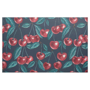 Red cherries on dark blue fabric