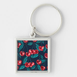 Red cherries on dark blue key ring