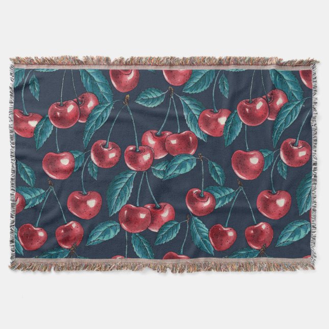 Red cherries on dark blue throw blanket (Front)
