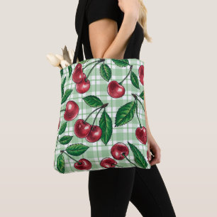 Red cherries on light green gingham tote bag