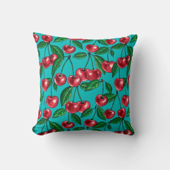 Red cherries on turquoise cushion (Front)