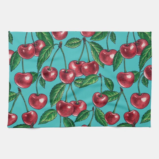 Red cherries on turquoise tea towel (Horizontal)