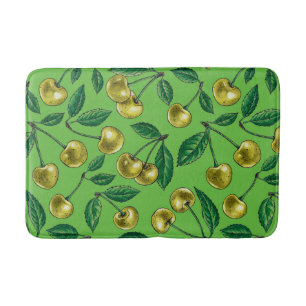 Red cherries on white bath mat