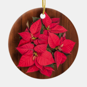 Red Christmas flower on brown wood Ceramic Tree Decoration