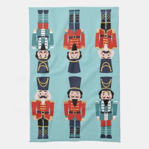 Red Christmas Nutcrackers on Sage Background Tea Towel