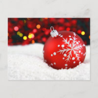 Red Christmas Ornament in Snow