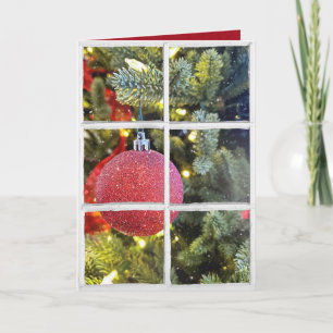 red Christmas ornament in snowy window Holiday Card